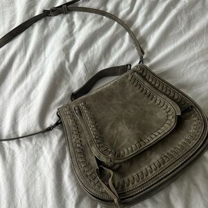Cross body saddle bag